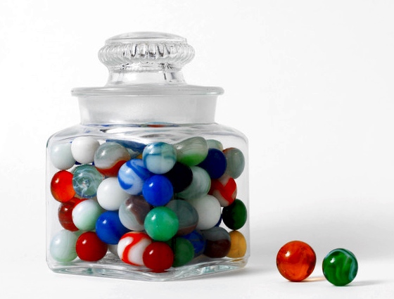 Marbles in and out of a jar