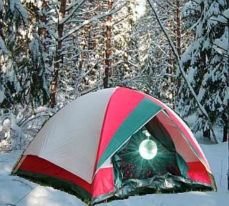 Tent in snow with disco ball