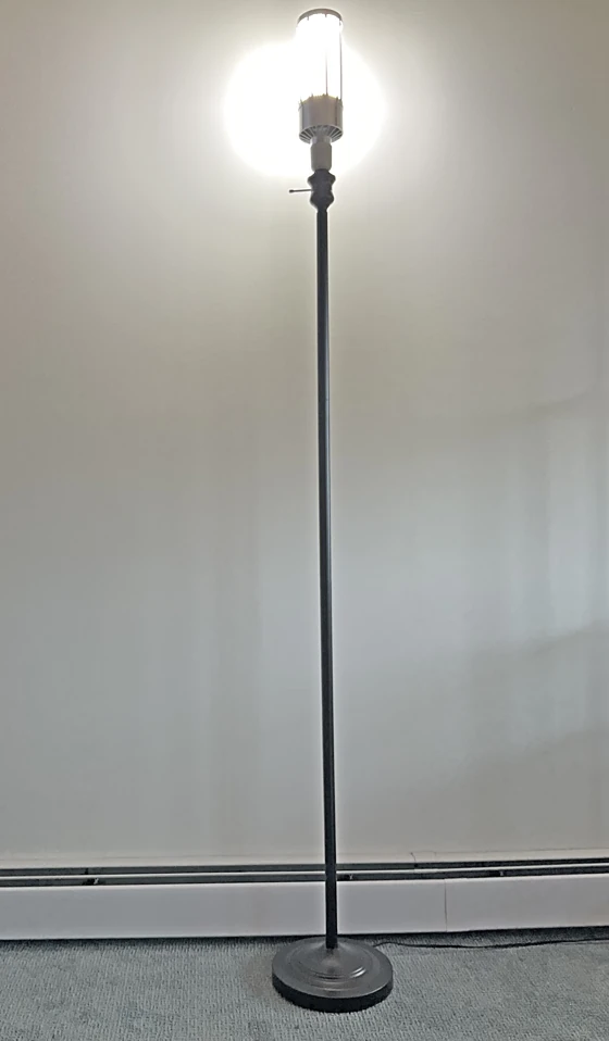 A large LED corn bulb in a standing floor lamp